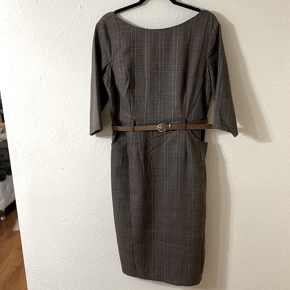 Purchased in London. Never been worn.